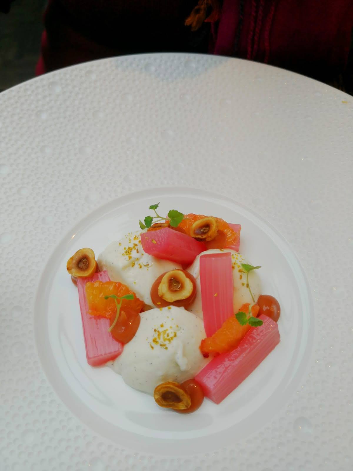 Vanilla cream with poached rhubarb, blood orange and hazelnuts